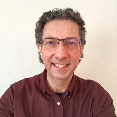 Headshot of editor Dominic Fenn